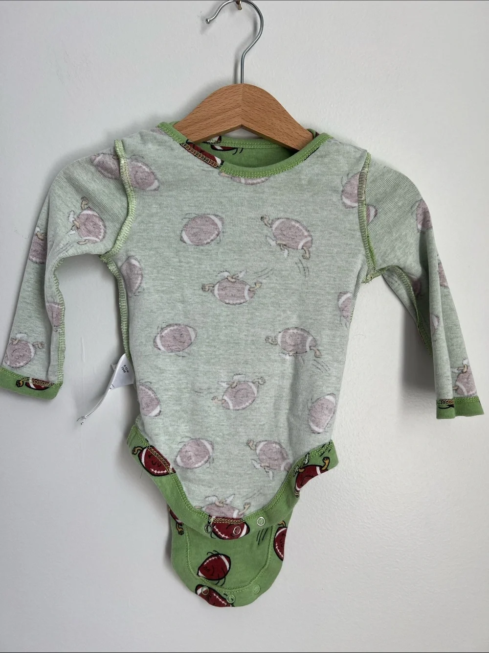 Old Navy | Green Football-Print Long-Sleeve Baby One-Piece 6-12 Months